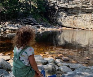 Little girl admires a view of Awosting Falls