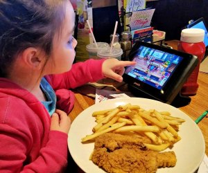 Keep the kids busy at Applebee's with games on a tableside tablet. Photo by Anne Caminiti - Momee Friends of Long Island  www.momeefriendsli.com 