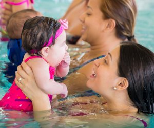 Mommy & Me swim classes are a great way to get babies used to the water. Photo by Fat Camera, courtesy of Canva