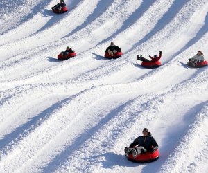 Catch a thrill on the snow tubing hills at Mt. Peter. 