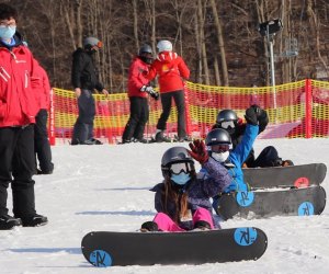 What better way to try out snowboarding than with a FREE beginner lesson at Mount Peter. Photo courtesy of the resort