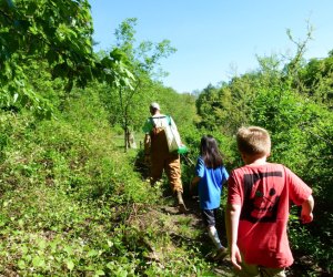 Photo of children walking on a trail at one of CT's afterschool programs.