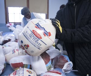 Many organizations throughout New York City are offering free turkey giveaways, plus full, hot Thanksgiving dinners this season. Photo by John McCarten for the New York City Council 
