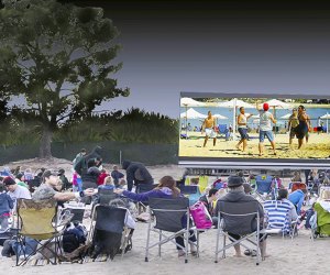 See a movie on the beach while warm evenings linger. Photo courtesy of Newport Dunes 