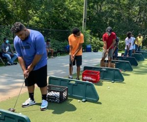 At the Boys & Girls Club camp, activities include golf. Photo courtesy of the camp