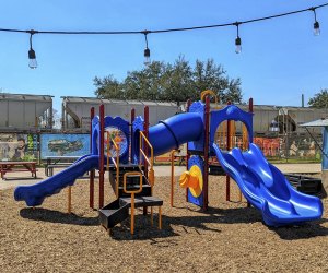 a picture of a playground at No Label Brewing Co., one of the best kid-friendly restaurants in Houston