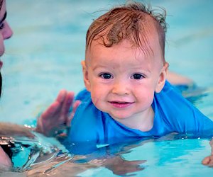 Babies can gain comfort and confidence in the water with mommy-and-me swimming lessons at two Asphalt Green locations. Photo courtesy of the venue