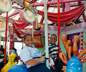 NYC's Best Parks and Playgrounds for Kids Birthday Parties: Totally Kid Carousel at Riverbank State Park.