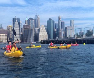 NYC boat ride with kids kayaking in the East River