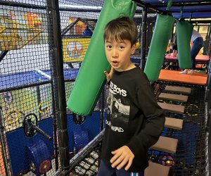 Kids can run, swing, jump, climb, and twirl in the custom designed, multi-floor climber at Complete Playground. Photo by Diana Kim