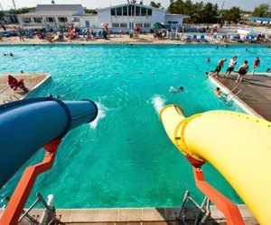 Nab a summer membership to Breezy Point Surf Club and go for a dip in the pool or a wild water slide ride. Photo courtesy of the club