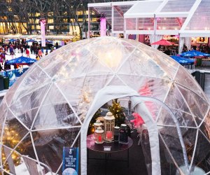 Revel with the family in your own private igloo at Bryant Park's Winter Village. Photo by Kevin Ornelas 