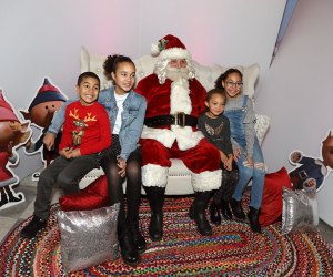 family at Paley Land with Santa