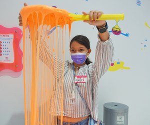 Stretch, mold, squish, and play with slime to your hearts content at the Sloomoo Institute in Soho. 
