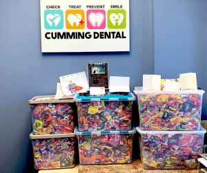 containers filled with candy in a dentist's office