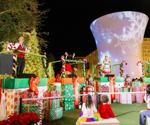 Lake Nona's holiday festival features fun activities for the whole family, including snowfalls, live shows, and entertainment. Photo courtesy of the festival