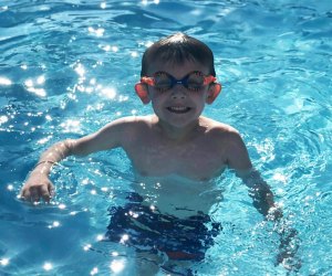 Best Orlando Pools with Day PassesL Boy swimming in pool 