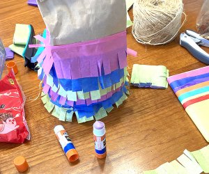 It's easier than you'd think to turn a simple paper lunch bag into a festive piñata!