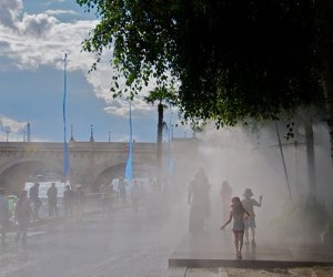 Let the kids cool down in Paris under the water sprays at Paris Plage. Photo by h2v via Flickr.
