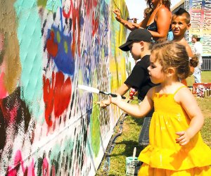 Endless summer festivities and fun await at Patchogue's Great South Bay Music Festival at Shorefront Park. Photo by Benny Migs