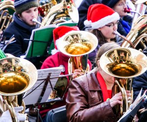 Music fills the air, as light festivals and winter wonderlands mark  Thanksgiving Weekend 2022 in Boston! Boston Tuba performance photo by Peter Lee, via Flickr (CC BY-NC-ND 2.0)