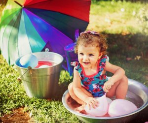 Sensory Activities for Toddlers, Infants, and Kids: Playing catch with Water Balloons