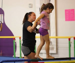 Test your balance at Aerials Fit N Fun Gymnastics Center. Photo courtesy of the center