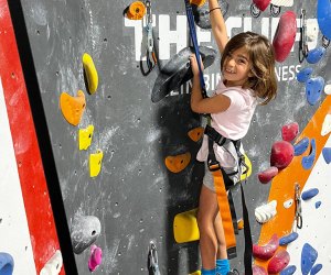 The climbing wall at The Cliffs at Callowhill challenges kids to climb to new heights. 