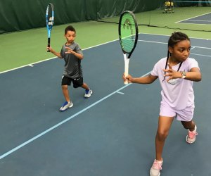Kids perfect technique at Legacy Youth Tennis and Education Camps. Photo courtesy of Legacy Youth Tennis and Education Camps