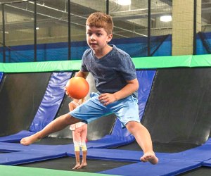 Photo of a child bouncing at trampoline park - Heat Wave Hot List