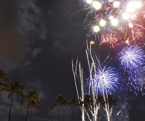 The fireworks reflecting in the water dazzles. Photo courtesy of cruisenewportbeach.com