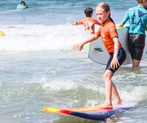 Kids will love riding the waves. Photo courtesy of Learn to Surf LA