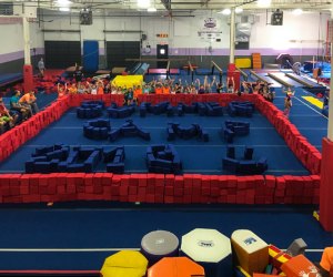 Kids of all ages can learn and grow at these sports summer camps. Photo courtesy of New Era Gymnastics