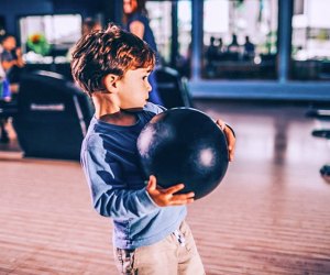 Little boy trying for a strike! Photo courtesy of Pinstripes