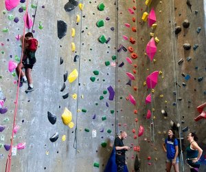 Photo of kids at an indoor rock wall - Things To Do with Teens