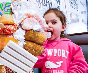 Photo of a child eating donuts - Best Fun Restaurants for Kids' Birthdays in CT