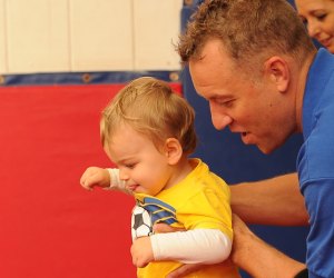 Babies are itching to move and groove, and these Boston classes fit the bill! Photo courtesy of the Gymnastics Academy of Boston