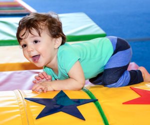 Photo of toddler on a gym mat - Things To Do with Preschoolers in CT