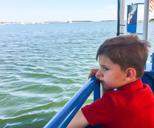 Photo of child on a Cape Cod boat- Budget Weekend Getaways