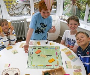 Kids play Monopoly Holidays & Activities for November 2024 Play Monopoly Day