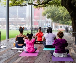Yogis aged 10 and up can enjoy a special class that includes poetry being read aloud while performing yoga flows at Discovery Green. Photo courtesy of Sarah Nielson.
