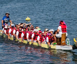 Teams of dragon boats take to the water in Port Jefferson. Photo courtesy of the Port Jefferson Chamber of Commerce