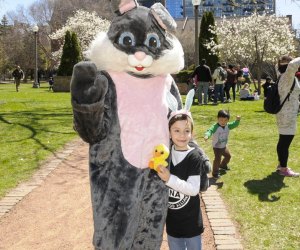 Little girl with the Easter Bunny. Photo courtesy of the Prairie District Neighborhood Alliance