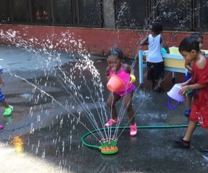 Enjoy some old-fashioned summertime sprinkler fun during summer camp at The Bronx House. Photo courtesy of the camp