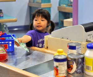 Check me out as I check you out, at Pretend City Children's Museum.