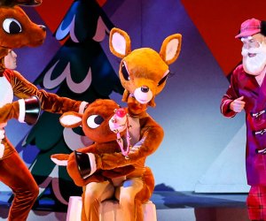 Santa comes to Boston this Thanksgiving Weekend 2023, courtesy of Rudolph and company! Production photo from Rudolph the Red Nosed Reindeer, the Musical