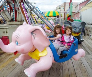 kids on an amusement park ride