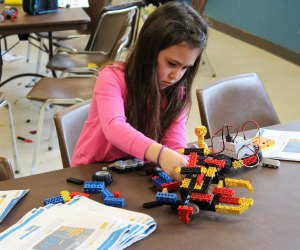 In RoboThink classes, kids learn to build and code robots. Photo courtesy of RoboThink
