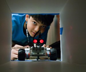 Students can test handmade robots on obstacle courses.