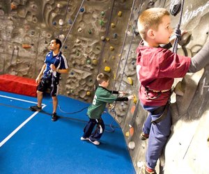 Kids can go rock climbing at the Chelsea Piers Field House